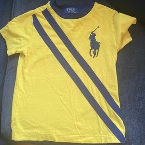 Yellow and navy blue polo kids shirt sleeve.